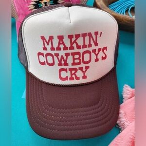 Makin’ Cowboys Cry Brown and White Trucker Hat with Red Text